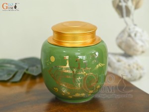 Lọ chè dáng thấp họa tiết hoa Sen vàng kim, nền xanh lá, 150g