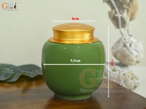 Lọ chè dáng thấp họa tiết hoa Sen vàng kim, nền xanh lá, 150g