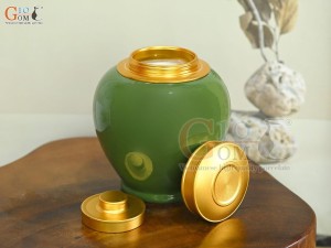 Lọ chè dáng tròn họa tiết hoa Sen vàng kim, nền xanh lá, 250g