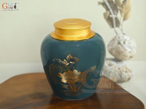 Lọ chè dáng tròn họa tiết Thuận Buồm Xuôi Gió vàng kim, nền xanh dương, 250g