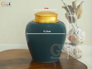 Lọ chè dáng tròn họa tiết Thuận Buồm Xuôi Gió vàng kim, nền xanh dương, 250g