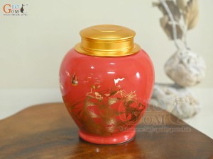 Lọ chè dáng tròn họa tiết Thuận Buồm Xuôi Gió vàng kim, nền đỏ, 250g