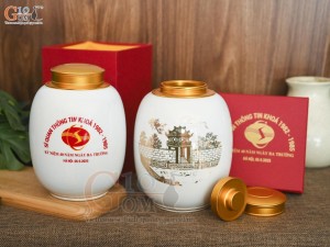 Lọ chè men trắng nắp kim loại dáng bom, họa tiết Khuê Văn Các in logo