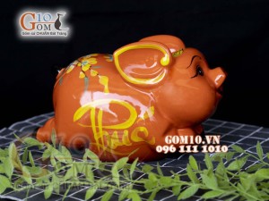 Heo sứ tiết kiệm dáng bay nền cam, 26x16 H16cm