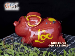 Heo sứ tiết kiệm dáng bay nền đỏ, 26x16 H16cm