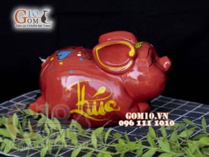 Heo sứ tiết kiệm dáng bay nền đỏ, 26x16 H16cm