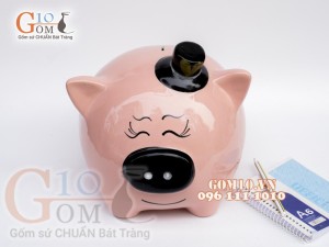 Heo sứ tiết kiệm đeo nơ màu hồng, cao 23cm