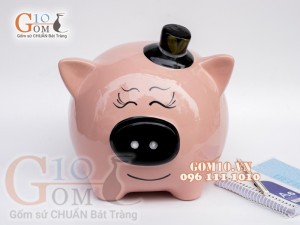 Heo sứ tiết kiệm đeo nơ màu hồng, cao 23cm