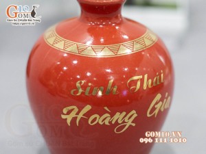 Nậm rượu dáng bầu cao men màu đỏ in logo