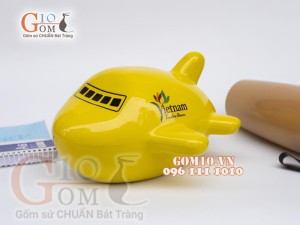 Tàu bay sứ tiết kiệm màu vàng dài 20cm 