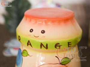 Tiết kiệm sữa chua màu cam, cao 14cm