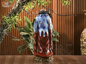 Tượng Đạt Ma quá hải áo xanh men hoả biến, cao 65cm