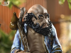 Tượng Đạt Ma quá hải áo xanh men hoả biến, cao 65cm