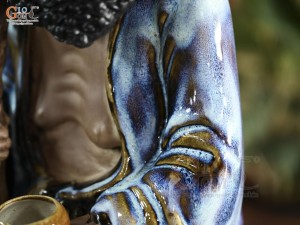 Tượng Đạt Ma quá hải áo xanh men hoả biến, cao 65cm