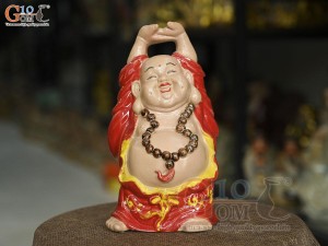 Tượng Di Lạc dáng nâng vàng men màu, cao 22cm