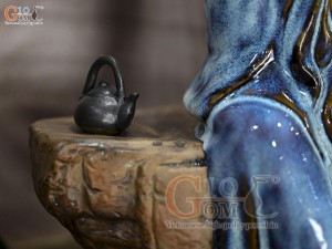 Tượng gốm thần trà men hỏa biến xanh đá, rộng 41cm