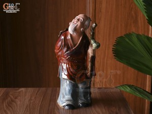 Tượng lão mai chống gậy men hỏa biến đỏ, cao 42cm