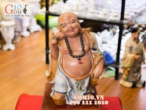 Tượng sứ Di Lạc cầm châu sa 44cm