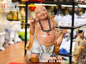 Tượng sứ Di Lạc cầm châu sa 44cm