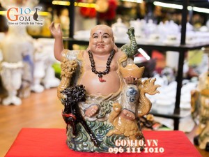 Tượng sứ Di Lạc cảnh Tứ Linh đen 38cm