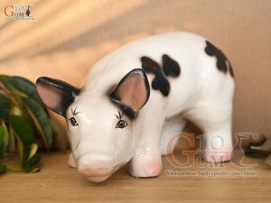 Tượng sứ heo lai đốm, dài 27cm Tượng sứ heo lai đốm, dài 27cm