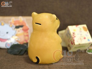 Tượng sứ tiết kiệm capybara vàng đậm, cao 17cm