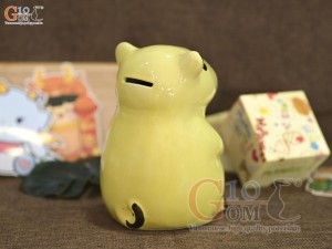 Tượng sứ tiết kiệm capybara vàng nhạt, cao 17cm