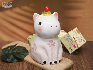 Tượng sứ tiết kiệm dáng ngựa màu hồng, cao 22cm