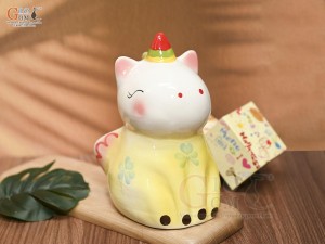 Tượng sứ tiết kiệm dáng ngựa màu vàng, cao 22cm
