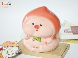 Tượng sứ tiết kiệm dáng trái đào màu đỏ, cao 20cm
