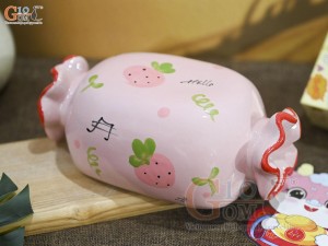 Tượng sứ tiết kiệm kẹo candy màu hồng, dài 21cm