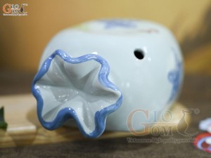 Tượng sứ tiết kiệm kẹo candy màu xanh, dài 21cm